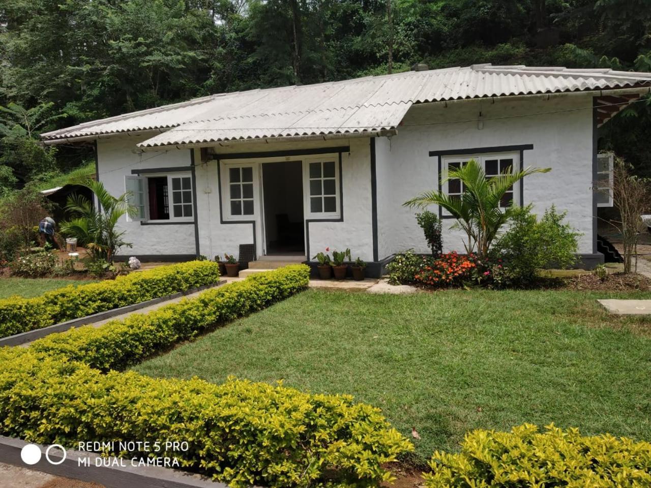 Munnar Heritage Bungalow Extérieur photo